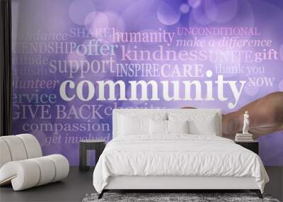 Your Community matters word tag cloud - male open palm hand with the word community floating above surrounded by a relevant word cloud on a purple bokeh background Wall mural