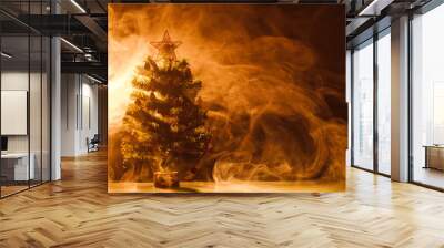 Christmas tree in ice fog, orange background Wall mural