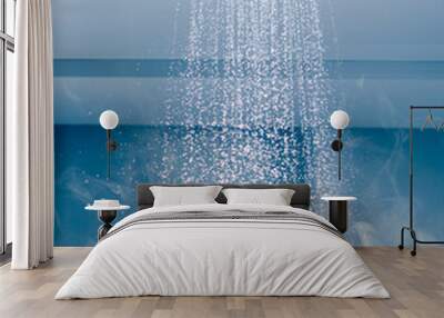 contrast shower with flowing water stream and steam Wall mural