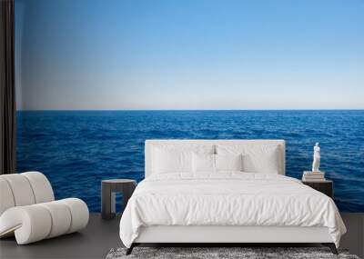 Background of sparkling sea water on a bright sunny day. Sea and sky Wall mural