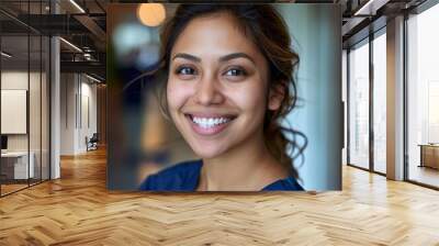 Portrait of a smiling young nurse in hospital Wall mural