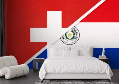 Switzerland and Paraguay, symbol of national flags from textile. Championship between two countries. Wall mural