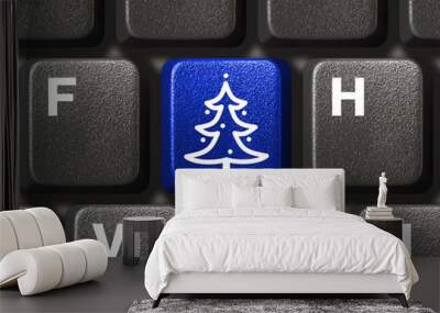 Computer keyboard with Christmas tree key, business concept Wall mural