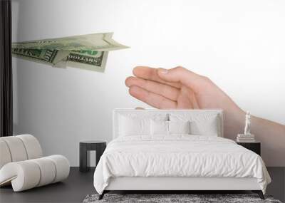 Hand and flying money plane Wall mural