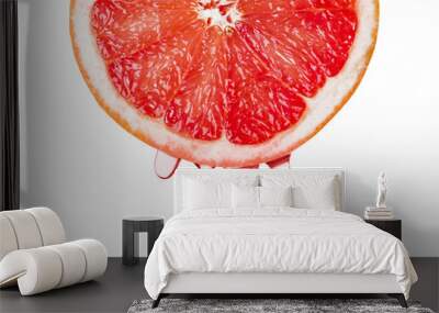 Ripe grapefruit and drops of juice Wall mural