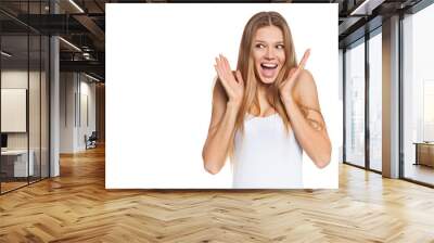 surprised happy young woman looking sideways in excitement Wall mural