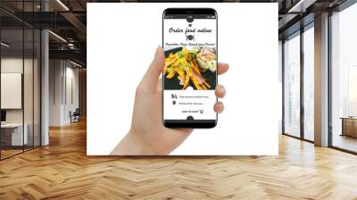 Isolated female hand holding smartphone and ordering vegetarian food online Wall mural