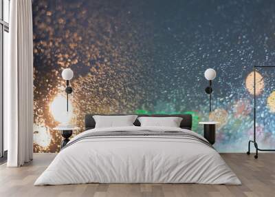 Blurred background with raindrops and lights. Wall mural