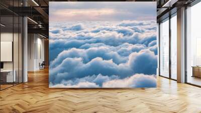 View of the clouds from above at dawn Wall mural