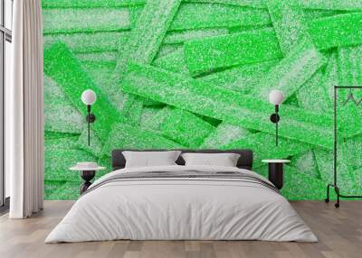 Green juicy gummy candies background. Top view. Jelly  sweets. Wall mural