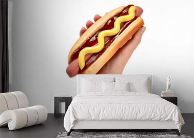 Hot dog in woman hand isolated on white background. Copy space. Wall mural