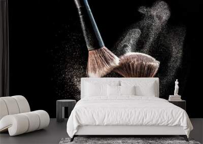 Make up cosmetic brushes with powder blush explosion on black background. Skin care or fashion concept. Wall mural