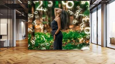 numerology, beautiful girl standing in the forest, surrounded by numbers Wall mural