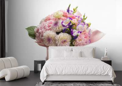 Pink and purple bouquet of flowers in a pink box isolated on white. Wall mural