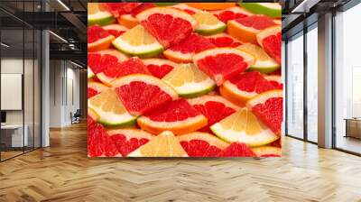 Pomelo and grapefruit slices background. Wall mural