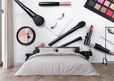 Professional makeup products with cosmetic beauty products, foundation, lipstick,  eye shadows, eye lashes, brushes and tools. Wall mural