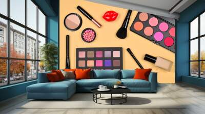 Professional makeup products with cosmetic beauty products, foundation, lipstick,  eye shadows, eye lashes, brushes and tools. Wall mural