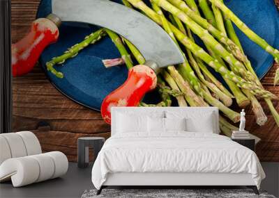 Fresh asparagus on wooden background Wall mural