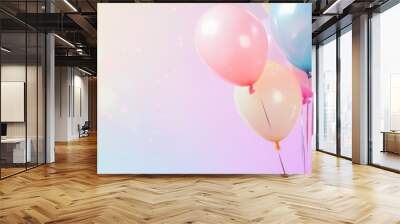 Colorful celebration a festive display of balloons against a soft pastel background Wall mural