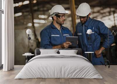 Two people working. Male Industrial Engineers Talk with Factory Worker while Using tablet. Wall mural