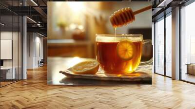 Warm refreshment a cozy cup of honey lemon tea in sunlit kitchen Wall mural