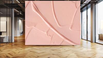 Pink cosmetic clay smudge background. Pink creamy cosmetic texture. Pink clay mask textured smears close up. Cosmetic clay for face and body skin care procedures. Wall mural