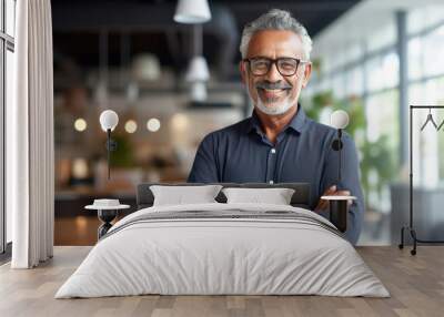 Confident and successful Indian senior man, smiling Wall mural