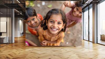 happy Indian children looking up Wall mural