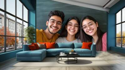 happy indian young business startup students having fun together making selfie posing in classroom office Wall mural