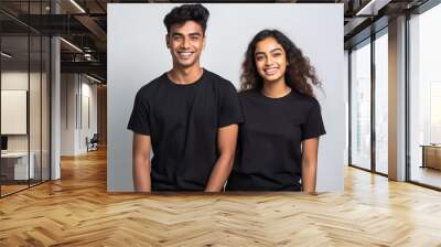 Indian couple in black t shirt on white background Wall mural