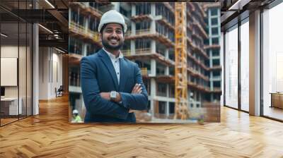 indian engineer standing confident on construction site Wall mural