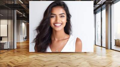 Young and beautiful indian woman smiling on white background. Wall mural