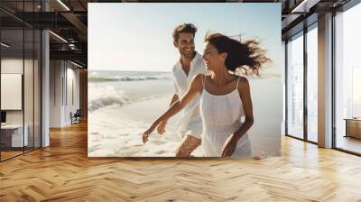 young indian couple enjoying at sea beach Wall mural