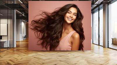 young indian woman with long and shiny hair style Wall mural