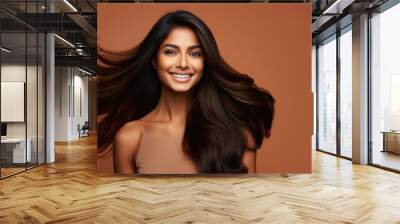 young indian woman with long and shiny hair style Wall mural