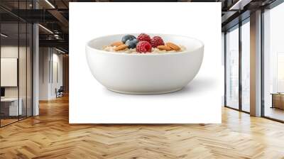 Delicious bowl of oatmeal with fresh raspberries blueberries and almonds for a healthy breakfast delight Wall mural