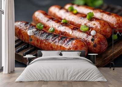 Grilled sausages on a wooden platter with fresh green onions garnish for delicious summer bbq recipe ideas Wall mural