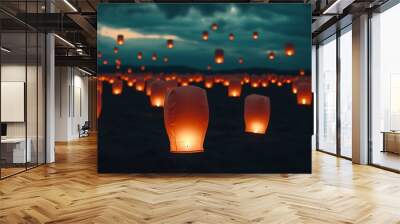 Magical night sky illuminated by floating lanterns a breathtaking display of light and wonder in the darkness Wall mural