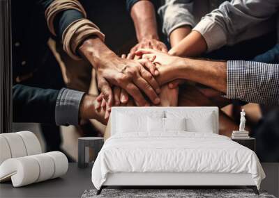 a team of people and their hands together as a group Wall mural