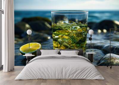 water in a glass by the ocean Wall mural