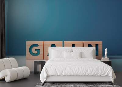 A minimalist portrayal of the word 'GAIN' in wooden blocks against a calming blue background, symbolizing growth and success. Wall mural