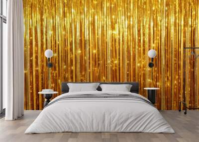 A close-up view of shimmering golden tinsel strips hanging as a curtain, reflecting light and creating a sparkling effect. - gold, tinsel, curtain, shimmer, sparkle, glitter, shiny, metallic, backgrou Wall mural