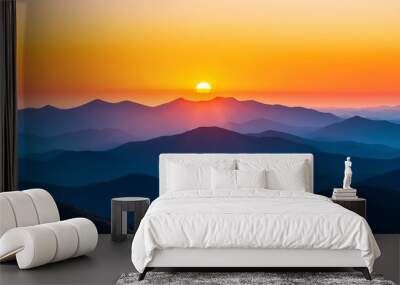 Golden Hour Sunrise Over Majestic Mountains, a breathtaking panorama of a vibrant orange sunrise illuminating the rolling hills, symbolizing the beauty of nature, new beginnings, hope, and a sense of  Wall mural