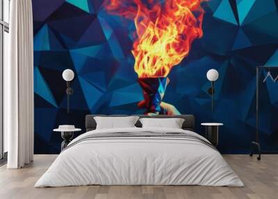 Hand Holding a Burning Torch Against a Blue Polygonal Background - A hand holds a burning torch, symbolizing inspiration, passion, leadership, determination, and hope, set against a vibrant blue polyg Wall mural