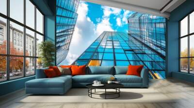 Looking Up at Glass Towers - A shot of a modern cityscape featuring glass skyscrapers and a bright blue sky, symbolizing ambition, progress, success, innovation, and growth. Wall mural