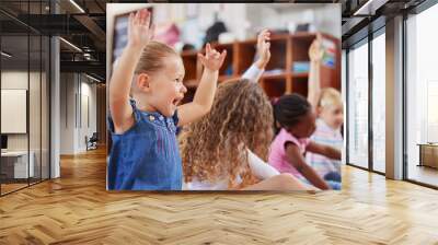 Im always excited to come to class. Shot of a group of children sitting in class. Wall mural