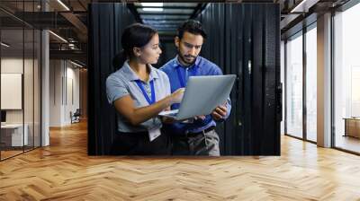 Laptop, server room and technician people problem solving in database management, system upgrade or cyber security. Error, data center or engineer employees, information technology and programming Wall mural