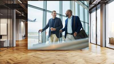 Travel for business, team at airport and men, catch flight for work trip with conference or training seminar with accountant. Walk, talk and diversity with finance convention and partnership Wall mural