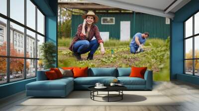 Agriculture, nature and sustainability farmer on phone call, working on farm with husband. Happy female talking to client about selling organic produce. Excited, success start of small green business Wall mural