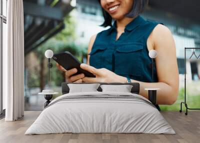 Email, happy and business woman in the city of Singapore typing on a mobile app on a phone for work. Corporate employee with a smile for communication and networking on smartphone in the morning Wall mural